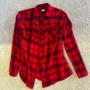 A new day red plaid button up top. Perfect for fall!